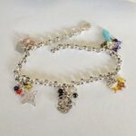 pulsera-arcoiris-de-amuletos-en-plata